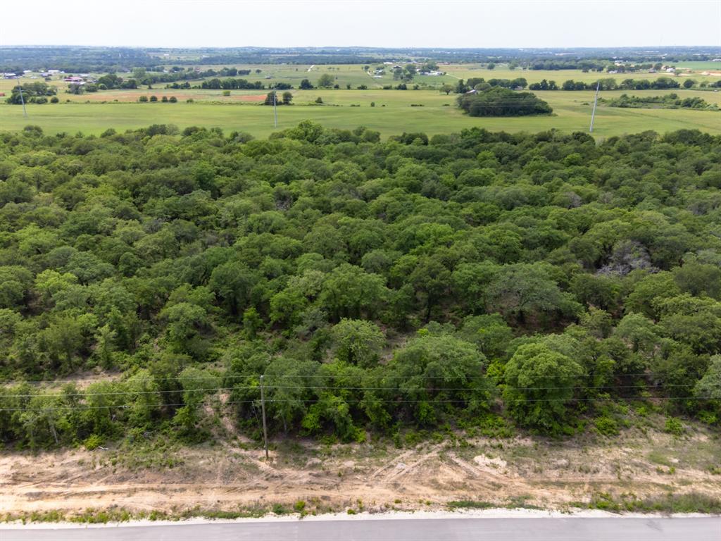 Almost 3 acres with large trees situated in the beautiful new development of Bella Oaks. Less than 15 minutes away from Historic Granbury and the shores of Lake Granbury. Tolar ISD. Perfect combination of small town feel and nearby amenities! Multiple lots available!!