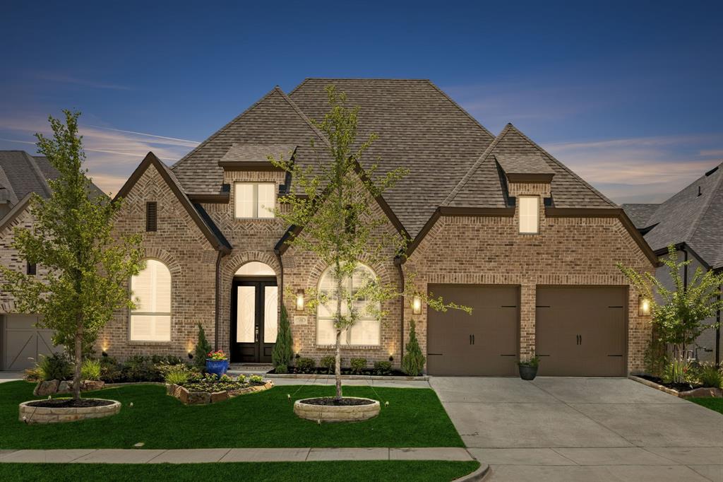 WHAT AN OPPORTUNITY! Get the interest buy down- but skip the construction delays! TODAY you can step into the home everyone WISHES their new build looked like!! Sellers bought Feb of last year and this-barely lived in - STUNNING Highland Homes 215 Plan is impeccably curated!  Thoughtful design, soaring ceilings, and timeless finishes come together to create a home that LIVES as beautifully as it looks! Perfectly blending modern luxury with timeless architectural design, this exceptional home immediately captivates with its striking elevation, dramatic rooflines, and undeniable curb appeal. Inside, soaring ceilings, wide-plank hardwood floors, and an abundance of natural light create an airy, sophisticated atmosphere that feels both grand and welcoming. A dedicated front office framed by a gorgeous arched window & plantation shutters create a designer-inspired workspace flooded w natural light.Just beyond, a private media room delivers the ultimate cinematic experience for movie nights, sporting events, or binge-worthy weekends.At the heart of the home is a show stopping kitchen featuring ceiling-height cabinetry, upgraded hutch, w designer finishes & exceptional storage.Open to the living and dining areas, it’s the perfect space for gathering with family and friends.The spacious family room is anchored by a beautiful fireplace and walls of windows that fill the home with natural light.The private primary suite offers a spa-like retreat, while thoughtfully positioned secondary bedrooms provide flexibility for family and guests, including a desirable front ensuite bedroom! Located in Sandbrock Ranch, one of the area’s most beloved owner-occupied communities; take in the white picket fences, resort-style pools, walking & biking trails, ponds,fire pits, fitness center, gathering spaces, and on-site elementary school if needed. 1404 Buttercup is designed for the way today’s families live, work, entertain & relax! The community is thriving-all it's missing is YOU!
