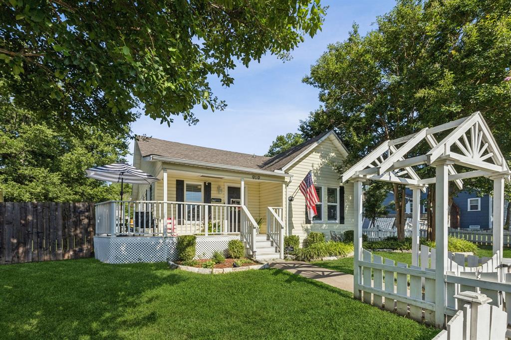 Step into timeless charm with this beautifully updated 3 bedroom, 2 bath home nestled in McKinney’s sought-after Historic District. From the white picket fence and covered front porch to the designer finishes inside, this home perfectly blends 1930s character with modern updates. Inside, you’ll love the open concept, all the light, hardwood floors, exposed beams, and custom woodwork, paired with a chef’s kitchen featuring custom cabinetry, floating shelves, stainless steel appliances, gas stove, and pantry. The primary suite offers an ensuite bath with full shower and walk-in closet, while secondary bedrooms provide great flexibility. Major updates include: newer HVAC, updated plumbing & electrical, tankless water heater, solar panels, new insulation, fresh paint, all-new windows with plantation shutters, and more! Outdoors, enjoy your own private space with a pergola, mature trees, and nearly half an acre of space—perfect for gatherings, play, or quiet evenings under the stars. All just a short stroll to Historic Downtown McKinney’s shops, cafés, schools, and events. Ask about the ASSUMABLE RATE!