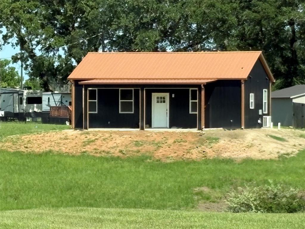 New construction barndominium located in Holiday Village of Lake Fork! This beautiful 2 bedroom, 1 bathroom home sits on approximately .7315 of an acre and offers a peaceful view from the spacious 10x25 front porch — the perfect place to enjoy your morning coffee or unwind in the evenings. The home also features an 8x10 back porch for additional outdoor space.

Inside, you’ll find an open layout with lots of windows providing great natural light, custom cabinets, granite countertops, and a stunning tile shower with a beautiful glass door. Conveniently located close to the boat ramp on Lake Fork, this property would make a great full-time home, weekend getaway, or investment property.

Residents of Holiday Village of Lake Fork enjoy access to great community amenities including a clubhouse, swimming pool, playgrounds, basketball court, fishing ponds, fishing pier, and multiple boat ramps into Lake Fork.

Home is nearing completion with more pictures coming soon!