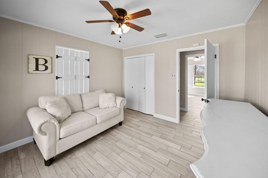 Welcome to your own slice of East Texas charm in Alba, where space, flexibility, and country living all come together on 2 beautiful acres! This cute and updated 4 bedroom, 2 bath home offers a warm and inviting feel from the moment you walk in, with a cozy living room centered around a wood burning cast iron fireplace that truly feels like home. The kitchen has been thoughtfully updated with granite countertops, a window above the sink that brings in natural light, plenty of cabinetry, and great pantry space for everyday functionality. Throughout the home you will find durable tile flooring designed to look like wood, giving you the aesthetic you want with the low maintenance lifestyle you need. All four bedrooms are comfortably sized with solid closet space, and the two bathrooms are well laid out for easy living. Outside is where this property really starts to stand out. In addition to the main home, there is a large detached two car garage and a true bonus, a Satterwhite log cabin complete with its own bedroom, full bathroom, kitchen, and washer and dryer hookups. Whether you are looking for a mother in law suite, guest space, or a potential income producing Airbnb, this setup gives you flexibility, especially being just minutes from Lake Fork. The property is fully fenced with a gated entrance and offers plenty of room to roam. This is the kind of property that checks a lot of boxes, whether you are looking for a primary residence, an investment opportunity, or both. If you have been searching for that perfect mix of charm, land, and versatility in East Texas, this one is worth a look!