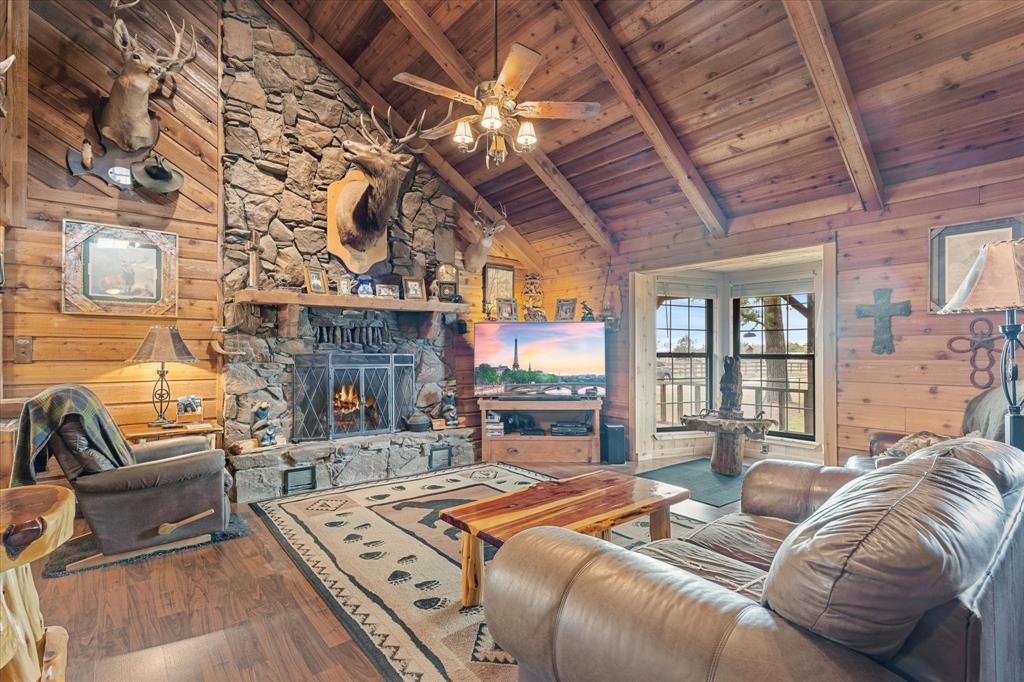 Ready for Country Chic on 3 Acres with 2 Homes & a 30x40 workshop?!

Nestled under a canopy of mature trees just off FM 902 in charming Collinsville this 3.07 acre homestead blends rustic tranquility with modern comfort.

Why you’ll love it:
 Main home:1.5 Story 1,529 sq ft, 3 beds, 1 large open living area anchored by a floor-to-ceiling stone fireplace and a rustic gourmet-style kitchen.
  Sun-soaked sunroom for entertaining, back porch grilling or storage.
The cozy carport protects you from the elements as you prepare to relax in your country oasis. 
Second home: A well kept 3 bedroom, 2 bath double-wide with its own utilities offers 2 living areas and a flex space perfect for a home office, craft room or man cave which is perfect for guests, extended family or rental income. 
 Workshop 30 × 40 building complete with full bath ideal for your hobbies, projects or even a home based business. Attached to the workshop you will find covered parking for additional equipment as well as an oversized covered parking area perfect for your RV, camper or boat! 
 Acreage highlights: fenced, cleared land ready for animals, garden, orchard or simply letting the kids roam.
Location: Quiet country feel yet quick access to Hwy 377 for a comfortable commute.
Lifestyle perks you’ll notice:
Not just a house;  a homestead. Imagine mornings on your porch, sunsets across the fields, and the simplicity of country living with style and function.
Multi generational ready: The dual-home setup means flexibility for older kids, parents, or guests without compromising your private space. Income potential: The second dwelling and workshop make this property appealing for rental, Airbnb or small enterprise.
Take action now: This kind of property  with acreage, dual homes, premium workshop space and a stunning rustic interior is a rare find at this price point. Don’t let someone else snag your country escape.
Schedule your private tour today. Your next chapter starts here!