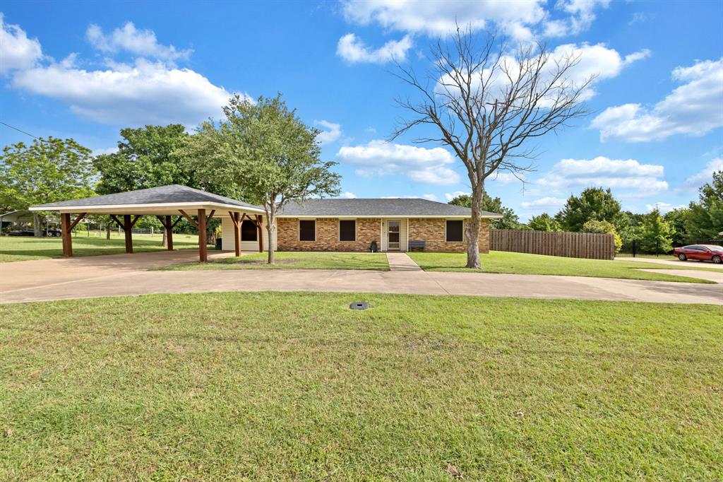 SELLER WILL OFFER $10K SELLER CONCESSIONS WITH PREFERRED LENDER! Enjoy the best of both worlds with this well-maintained home offering country living in the city on a spacious 1-acre lot! A welcoming circle driveway and carport provide ample parking and great curb appeal.  Inside, you’ll find an inviting eat-in kitchen, a desirable split-bedroom floor plan, laminate flooring, updated modern light fixtures, and solar screens for added energy efficiency. The spacious utility room features custom cabinetry and room for an additional refrigerator, adding convenience and extra storage.  Roof was replaced approximately 2 years ago and gutters. New windows and new septic plumbing were added in 2024.  Step outside to a covered patio overlooking the huge, fenced backyard, perfect for entertaining, gardening, pets, or simply enjoying the peaceful outdoor setting. A storage shed offers additional space for tools and equipment.  Conveniently located with easy access to shopping, dining, and Hwy 287, this property combines space, comfort, and accessibility in a sought-after location. Don’t miss this rare opportunity to enjoy country-style living with city conveniences just minutes away!