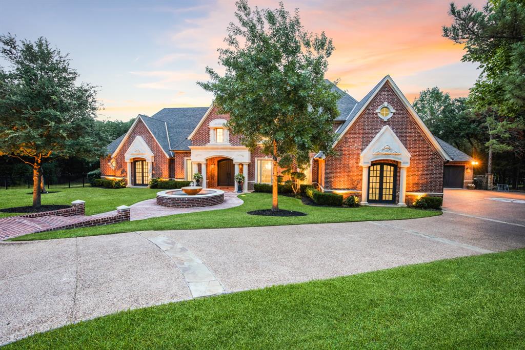 Exquisite Opportunity! UPDATED, Elegant, Gated Community, cul-de-sac, backing to green space. Resort style backyard oasis, chef style kitchen, Sub-Zero wine fridge, Wolf range, steam oven, & built in Miele coffee maker. Cristallo quartzite counter top. This custom build is designed for entertaining & family. With exorbitant living spaces on the 1st level, you will never want to leave. 2 living rooms, dining room, sunroom, library, executive office, game room, kitchen, master suite, guest suite, & oversized 4+ car garages with epoxy floors. 2nd level includes bedrooms and a state-of-the-art theater room. Step out to enjoy a screened patio, fireplace, diving pool, slide, spa, outdoor bar with a Twin Eagle grill, coy pond, & waterfalls. Professionally lit front and back. Fully equipped with Crestron Home Smart System that can be operated from your smart device. Minutes from AWARD WINNING schools, parks, shopping, restaurants, & only 15 min from DFW Airport. DON'T MISS THIS OPPORTUNITY!