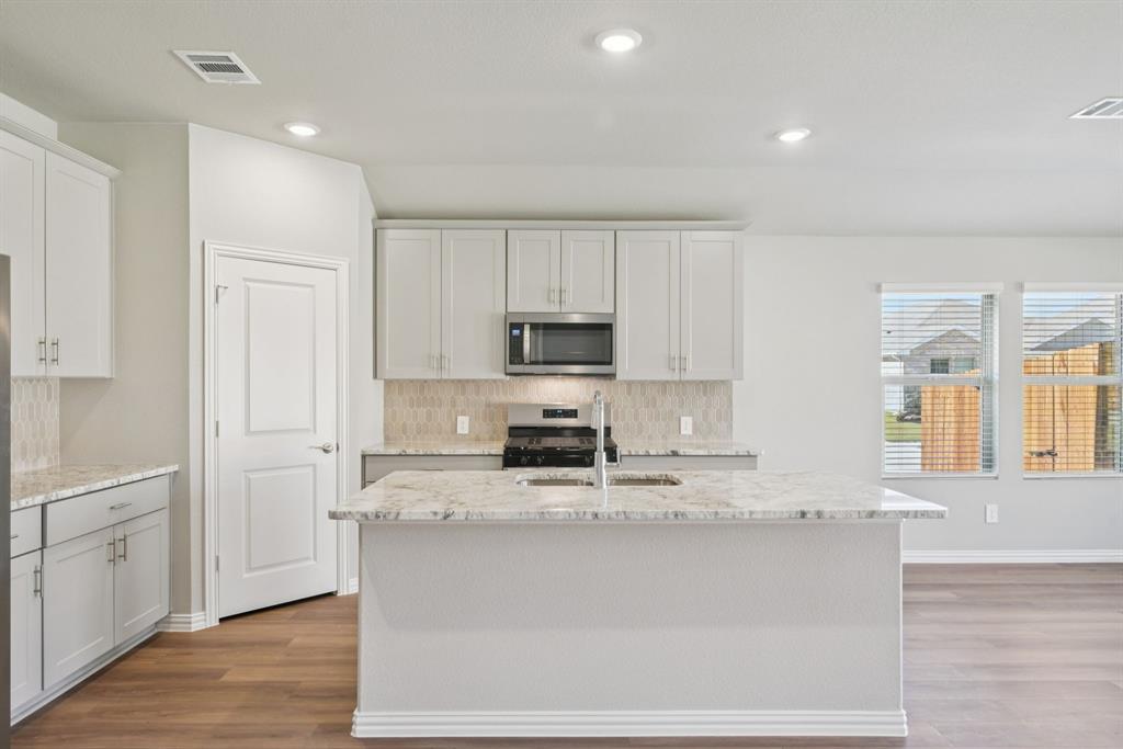 BRAND NEW energy - efficient home Jun 2026! The spacious living area flows seamlessly outdoors to the covered back patio. Pebble cabinets with marble-look white granite countertops, beige tone EVP flooring and multi-tone grey carpet. Situated perfectly in a small town, Stonehaven homeowners will enjoy the benefits of an effortless commute to Dallas using nearby I-20 and Highway 175. This serene community also boasts amenities including a resort-style pool, kid's splash pad, cabanas, and a children's playground. Schedule a tour and see our energy-efficient features like multispeed HVAC systems, spray foam insulation, and high-performance air filtration.* Each of our homes is built with innovative, energy-efficient features designed to help you enjoy more savings, better health, real comfort and peace of mind.