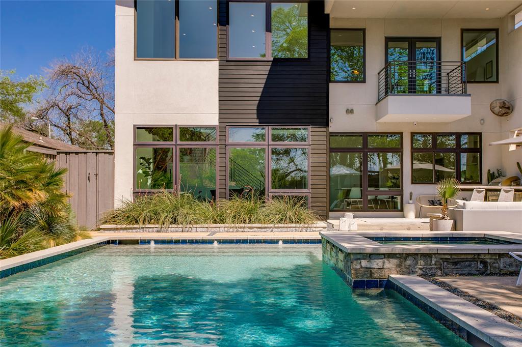 Custom-built and masterfully designed, this modern gem is nestled in the coveted Henderson corridor, blending sleek aesthetics with unmatched quality. From the moment you step inside, you'll be captivated by the museum-smooth walls, soaring ceilings, and walls of Anderson windows that bathe every corner in natural light.

The thoughtful layout welcomes you with a spacious entry, wide gallery-style hallways, and an open-concept living space that flows seamlessly into large, comfortable bedrooms. The kitchen is a chef’s dream, boasting a Wolf-Sub Zero appliance package, an abundance of custom cabinetry, a large center island, and expansive quartz counters, perfect for everything from gourmet meals to casual gatherings. The bedrooms are split in layout with the primary featuring a balcony overlooking the city skyline and rear yard.  All of the bathrooms are adorned with sleek, modern fixtures and luxurious finishes. 

But it’s the backyard that truly elevates this home to a serene retreat. Step outside into your own personal sanctuary, complete with a sparkling pool, relaxing spa, cozy fire pit, outdoor kitchen perfect for al fresco dining, and a lush, expansive grassy area. Whether you're hosting friends or enjoying quiet evenings under the stars, this outdoor space is designed for both relaxation and entertaining.

And the location? Highly walkable, with an abundance of dining, shopping, and entertainment options just steps away. If you’ve been searching for a spacious, modern home with a backyard oasis in the heart of one of the city’s hottest neighborhoods, look no further!