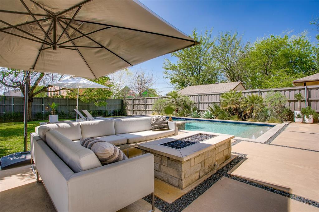 Custom-built and masterfully designed, this modern gem is nestled in the coveted Henderson corridor, blending sleek aesthetics with unmatched quality. From the moment you step inside, you'll be captivated by the museum-smooth walls, soaring ceilings, and walls of Anderson windows that bathe every corner in natural light.

The thoughtful layout welcomes you with a spacious entry, wide gallery-style hallways, and an open-concept living space that flows seamlessly into large, comfortable bedrooms. The kitchen is a chef’s dream, boasting a Wolf-Sub Zero appliance package, an abundance of custom cabinetry, a large center island, and expansive quartz counters, perfect for everything from gourmet meals to casual gatherings. The bedrooms are split in layout with the primary featuring a balcony overlooking the city skyline and rear yard.  All of the bathrooms are adorned with sleek, modern fixtures and luxurious finishes. 

But it’s the backyard that truly elevates this home to a serene retreat. Step outside into your own personal sanctuary, complete with a sparkling pool, relaxing spa, cozy fire pit, outdoor kitchen perfect for al fresco dining, and a lush, expansive grassy area. Whether you're hosting friends or enjoying quiet evenings under the stars, this outdoor space is designed for both relaxation and entertaining.

And the location? Highly walkable, with an abundance of dining, shopping, and entertainment options just steps away. If you’ve been searching for a spacious, modern home with a backyard oasis in the heart of one of the city’s hottest neighborhoods, look no further!