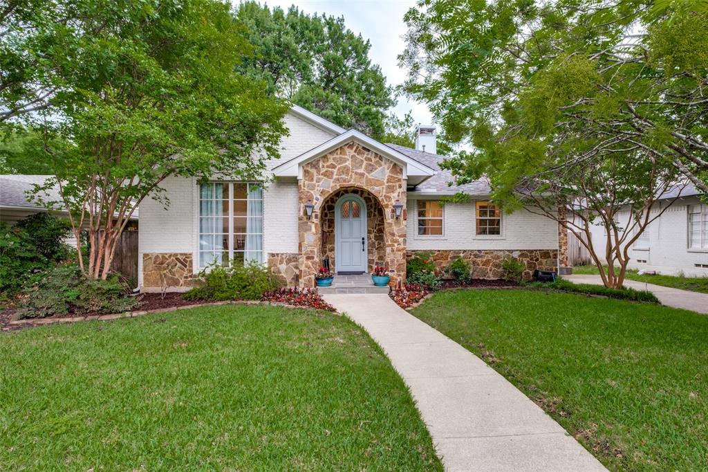 Completely updated and expanded in the highly sought-after Lakewood Elementary, this stunning home with guest quarters was taken down to the studs and thoughtfully reimagined with an open floorplan, soaring ceilings, and exceptional attention to detail throughout. The main home offers 3 bedrooms, 2 baths, and 2,235 square feet, plus detached guest quarters. The spacious living area features dramatic cathedral ceilings and a cast stone fireplace, seamlessly flowing into a chef’s kitchen with granite countertops, custom cabinetry, stainless appliances, and an oversized island with breakfast bar. Generous secondary bedrooms offer walk-in closets and a well-appointed Jack-and-Jill bath. The serene primary suite is a true retreat with a recently updated spa-like bath featuring dual sinks, separate shower and tub, and a large walk-in closet. French doors open to a covered patio and beautifully landscaped backyard. Detached studio quarters with HVAC provide flexible space for a home office, gym, or guest retreat, with the option to convert back to a garage if desired.
