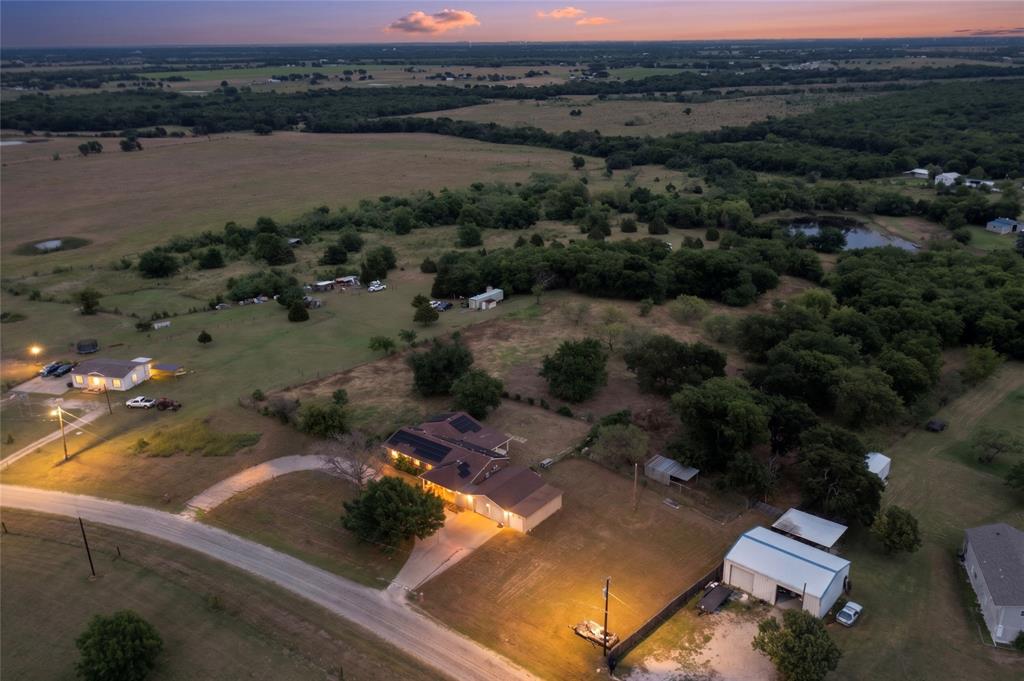 Rare opportunity to own two adjoining properties in the growing Crandall area, offering endless possibilities for homeowners, investors, or those seeking extra space. The sale includes an improved property at 8772 Highview Drive situated on approximately 4.12 acres, along with the adjacent vacant lot at 8764 Highview Drive on approximately 1 acre for a combined total of 5.12 acres together.

Enjoy the tranquility of country living with ample room for recreation, gardening, animals, workshops, equipment storage, or future improvements. The additional vacant lot provides flexibility for expansion, investment potential, or creating your own private retreat. Conveniently located within commuting distance of Dallas while maintaining the peaceful atmosphere of rural Kaufman County, this unique offering combines space, privacy, and opportunity in one package.

Whether you're looking for a homestead with room to grow, a multi-parcel investment opportunity, or a property with added flexibility, this combined offering is one you won't want to miss.