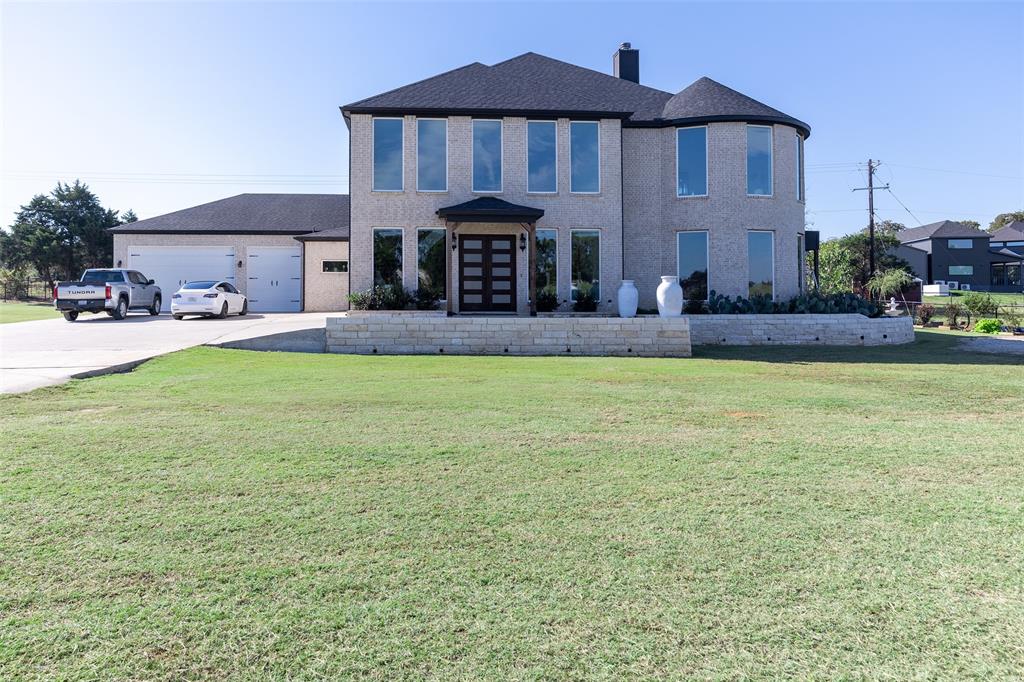 Where Luxury Meets the Land. Imagine a place where the air is crisp, the land fertile, and every sunrise feels like a private painting. This exquisite ranch estate offers absolute privacy, rich soil, and a thriving cattle operation — wrapped in the comfort of a 2022 on a serene 4-acre agricultural exempt estate. This custom-built residence is designed to impress. Inside, discover 5,690 square feet of modern elegance features a grand double staircase, 5 spacious bedrooms, 2.5 baths, a chef’s kitchen with professional-grade appliances. Floor to ceiling windows draw in natural lights, illuminating open-concept spaces that flow seamlessly to the outdoor living area with fully equipped kitchen. The primary suite is a masterclass in tranquility — featuring a spa-style bath, and a walk-in closet that blends luxury with practicality. Lush pastures, and endless views of open country. Enjoy modern comfort with ranch-style tranquility just 5 miles from Denton and minutes from Lake Lewisville, major retailers, and the PGA of America’s Frisco HQ. No City taxes, no HOA, and unmatched privacy. For those who dream of living beautifully and sustainably — this is your moment.