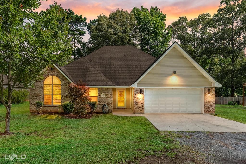 Charming Country Living with Modern Comforts in Haughton! Welcome home to 316 E. McKinley Avenue, where peaceful country living meets everyday convenience. Situated on approximately one acre in the heart of Haughton, this well-maintained property offers plenty of space to enjoy both inside and out. The large lot provides room for outdoor activities, gardening, entertaining, or simply relaxing while enjoying the privacy and tranquility of the area. 4BD 2BA - Remote master bedroom with huge walk in shower with dual heads. 3 spacious bedrooms and game room upstairs. Lots of space and Tons of storage. Fresh paint and willing to consider a flooring allowance with an acceptable offer. Fully privacy fenced back yard with cedar fencing. ADT security in place and transferable.