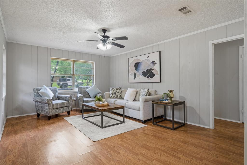 Seller offering Sellers Concessions! Welcome to this 3-bedroom, 2-bath home offering approximately 1,500 square feet, ideally situated on a corner lot in sought-after Canton ISD. Surrounded by mature trees, this property provides both shade and charm in an established neighborhood setting. Inside, you’ll find a functional layout with a mix of flooring and a sunroom that adds additional space—perfect for relaxing, entertaining, or enjoying natural light year-round. The kitchen and bathrooms have had some updates, offering a great starting point for buyers looking to add their own style and finishing touches. Additional features include an attached carport for convenient covered parking, a fenced backyard, and city utilities. Whether you’re a first-time buyer, investor, or someone looking for an affordable home in Canton ISD, this property presents a great opportunity. Conveniently located near local amenities, shopping, and schools, it’s ready for its next chapter.