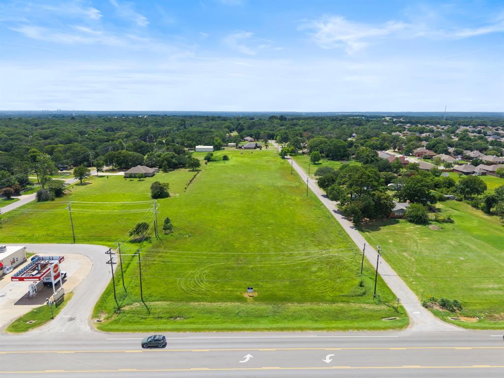 Prime Highway 377 Frontage Discover a rare gem in the City of Krugerville. This exceptional acreage perfectly balances commercial potential and or residential possibilities. This prime piece of real estate is not just a plot of land; it’s a blank canvas waiting for your vision to come to life. Step into visibility and accessibility with coveted highway frontage, ensuring maximum exposure for your future business endeavors. This strategic location draws local traffic and passersby, making it a hotspot for potential customers.

Additional Tract of Land offers plenty of room for new construction.

Growth Potential Krugerville is on the rise. Benefit from the area's ongoing development, with new businesses, residential projects, and amenities sprouting up nearby. Position yourself at the forefront of this growth, where your investment is set to appreciate.

Proximity to Major Highways With easy access to major transportation routes, your venture won’t just be a local point of interest; it’ll be a destination for those traveling through.

Diverse Market Opportunities Cater to a growing population eager for new services and experiences. With the right vision, this property can become a vibrant hub.