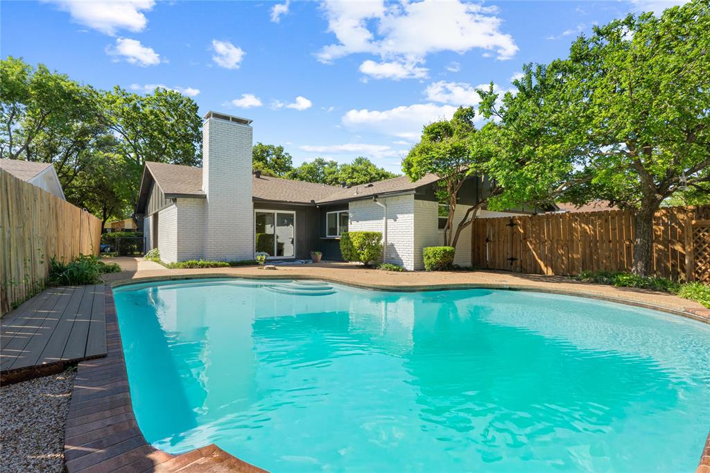 Now that's a home to brag about and invite friends over for a pool day.

Welcome to this beautifully updated 4-bedroom, 2.5-bath home in the heart of East Dallas. Fully renovated from top to bottom, 8617 Baumgarten Dr offers modern upgrades, stylish finishes, and exceptional indoor-outdoor living with a private swimming pool.

Inside, you’ll find new flooring, new windows, and a fully reconfigured open-concept layout designed for today’s lifestyle. The remodeled kitchen features quartz countertops, slim shaker-style cabinetry, a walk-in pantry, and a unique pass-through sliding window that opens directly to the backyard—perfect for serving food and drinks to the pool area while entertaining.

All bathrooms have been completely remodeled with updated fixtures and contemporary finishes. The spacious primary suite includes a beautifully updated ensuite bath, creating a private retreat.

Step outside to a backyard built for entertaining, complete with a sparkling pool and seamless indoor-outdoor serving access. Whether hosting guests or enjoying a quiet evening at home, this space is designed for relaxation and memorable gatherings.

Pool homes are less common in this established Dallas neighborhood, making this property a rare opportunity. In addition to its entertaining appeal, the home offers generous living space, a functional floor plan, and a warm atmosphere ideal for everyday family living.

Located in a desirable community with mature trees, this home is conveniently close to parks, shopping, dining, and major highways, providing easy access to everything Dallas has to offer.