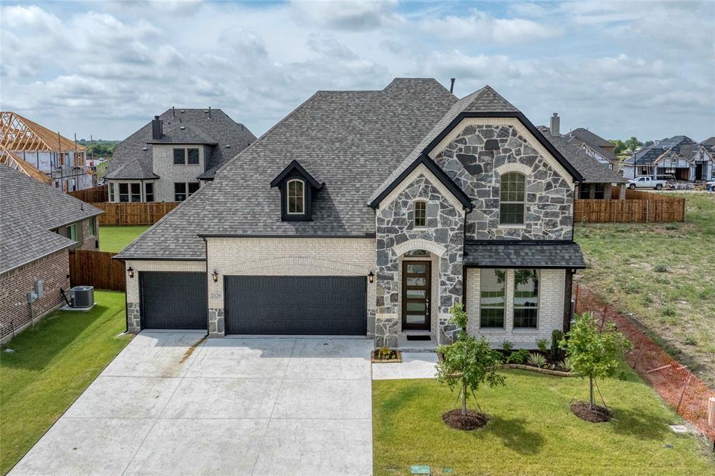 This beautiful and spacious 4 bedroom, 3.5 bath home is designed for modern living and entertaining. The open concept eat-in kitchen flows seamlessly into the living room, which features a cozy fireplace perfect for family gatherings. Wood like tile flooring runs throughout the home, offering both style and durability. Enjoy multiple flex spaces, including a large game room, dedicated media room for movie nights, and a private office ideal for working from home. The generous 3 car garage provides ample storage and parking. This home combines comfort, function, and style in every detail.