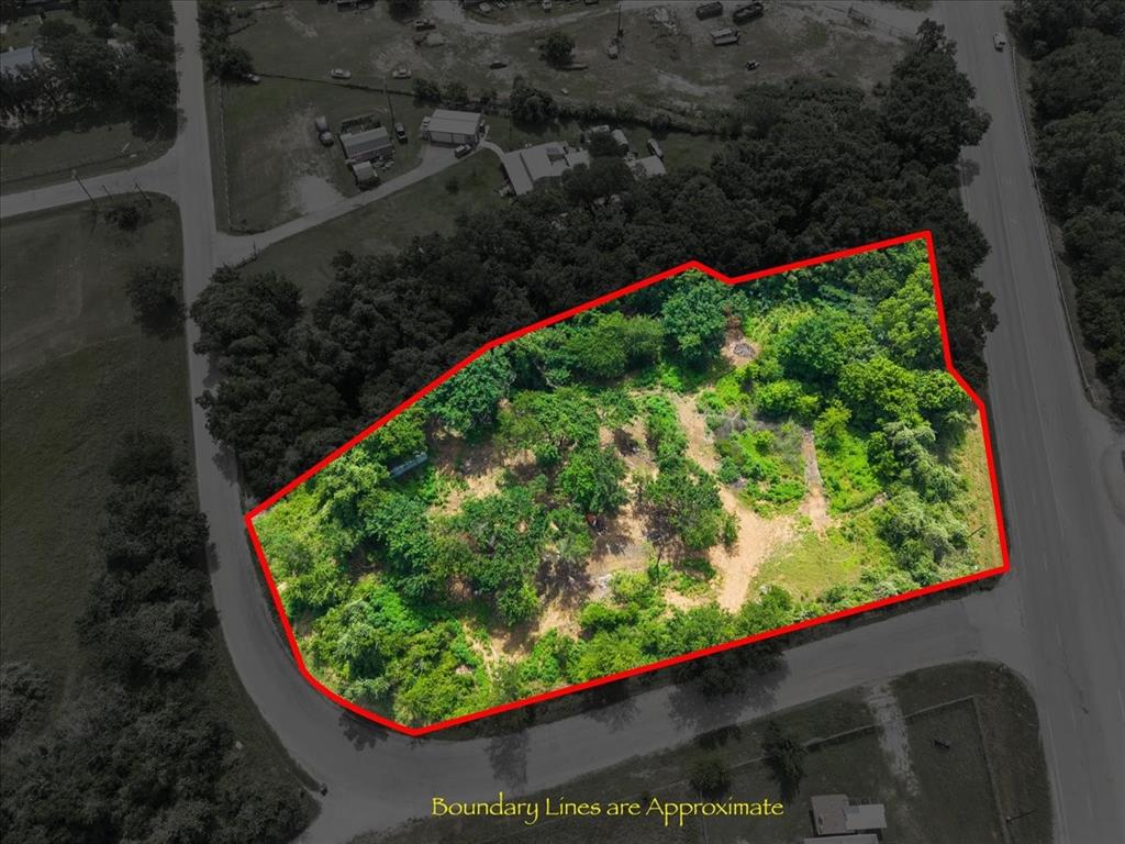 Back on market, prior contract terminated (no fault of seller). Land has been cleared and title is ready for a smooth transaction. NEW SURVEY AVAILABLE!   

Is there land in Texas under $250K? Yes: 2.36-acre land in Wise County with prime frontage on both Hwy 114 (approx. 260 ft) and CR 4590 (approx. 480 ft). This corner lot offers excellent access and high visibility, ideal for a future homesite, business opportunity, or investment hold (verify use and zoning). Located just minutes from Boyd and Springtown, with utilities nearby and no HOA. Cleared and ready for your vision. A rare chance to own usable acreage in a fast-growing area of North Texas.