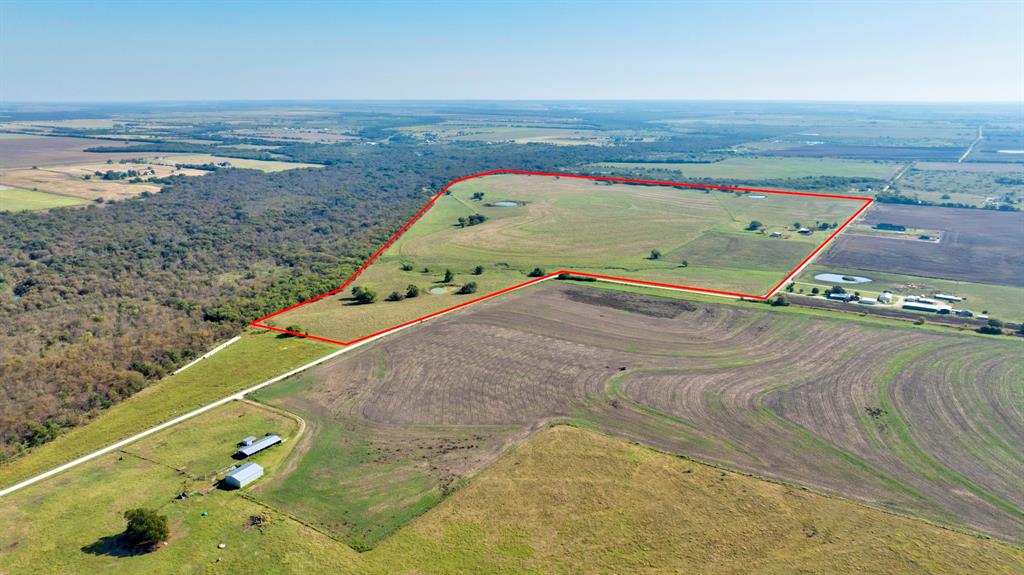 Prime Commercial Development Opportunity – 185.26 Acres in Grayson County, TX.

Exceptional large tract investment opportunity located less than 2 miles from the projected Dallas North Tollway expansion, positioning this property perfectly for future commercial, industrial, or residential development.

This 185.26-acre Ag-exempt tract offers approximately 3,875 feet of frontage along Baker Road and partial border with the U.S. Army Corps of Engineers land on the west side. The elevated center provides superior drainage across all four directions, making it development-ready with minimal grading requirements.

Existing improvements include a 2,096 sq-ft home and two barns, offering immediate rental income potential or functional on-site storage during project development. The property’s coastal Bermuda pastures are well-maintained, supporting continued agricultural use and tax advantages while future plans are pursued.

Strategically located just 10 minutes from Hwy 377 and 25 minutes from Prosper and Frisco, this site lies in the direct path of North Texas growth. With tollway expansion projected to bring major connectivity and commercial demand to the area, this tract presents a rare chance to secure high-growth acreage in one of the fastest-developing corridors in the region.