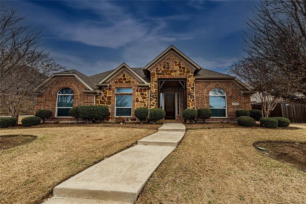 Amazing ONE-STORY home in the desirable Villages at Willow Bay! Prime location near top schools, shopping, dining, and everyday conveniences. This thoughtfully designed home offers 4 bedrooms plus a media room or private office, neutral colors, and a fresh, move-in-ready feel. The spacious floor plan features an open kitchen and living room ideal for entertaining, complete with a large island kitchen and gas cooktop, split secondary bedrooms for added privacy, excellent storage throughout, and a cozy, low-maintenance design. Enjoy peaceful views and lots of play time with the large greenbelt directly across the street. The primary suite boasts a frameless glass shower and generous closet space. Additional highlights include a 3-car rear-entry finished garage with a wide alley, freezer space in the utility room, new roof, and low utility costs. This home offers location, comfort, and value all in one—Frisco ISD!