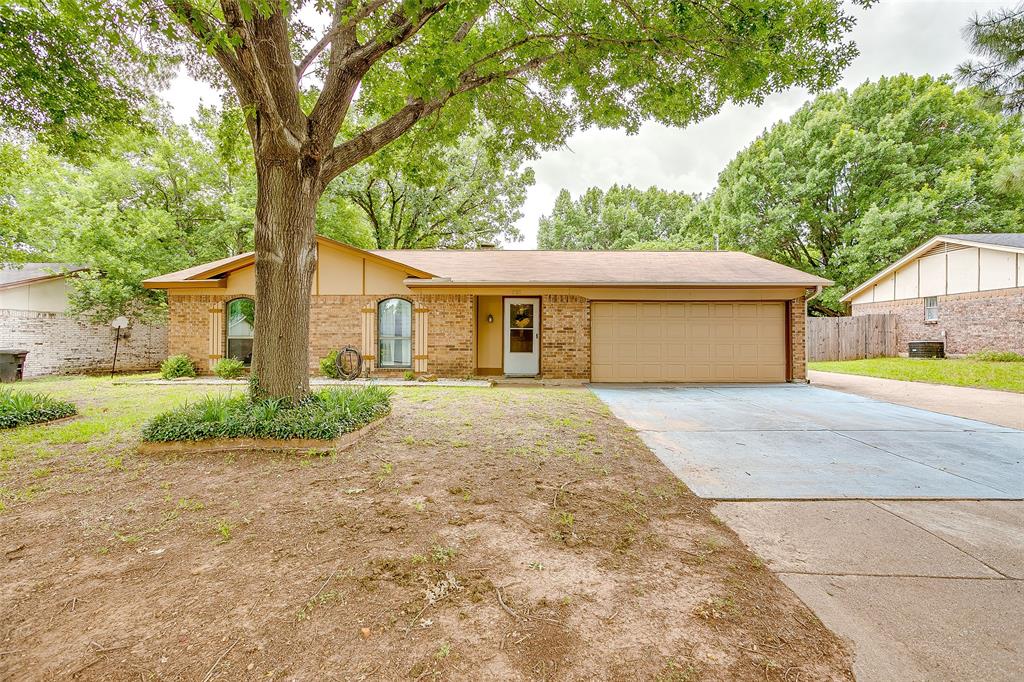 Nestled in the heart of Burleson, this charming 3-bedroom, 2-bath home offers comfort, character, and a hard-to-find workshop that sets it apart from others in its price range. Situated in an established neighborhood shaded by mature trees, the property provides a welcoming setting with easy access to shopping, dining, schools, and everyday conveniences. Inside, you’ll find two living areas connected by a striking double-sided fireplace, creating a warm and inviting atmosphere perfect for entertaining or relaxing with family. The generously sized family room offers plenty of space to gather, while the kitchen features granite countertops, white cabinetry, tumbled marble backsplash, and open concept layout. Bedrooms are all nice size with ceiling fans, and both bathrooms have been tastefully updated from their original build with tile finishes. Outside, an extended 121' driveway leads through a private gate to the backyard, offering additional parking for a boat, RV, etc. And provides convenient access to the impressive 15x20 workshop complete with electricity—a rare and valuable feature for this area and price point. Whether you need space for hobbies, projects, storage, or a home-based business, this versatile workshop is sure to impress. Don’t miss the opportunity to own this well-maintained home with unique features, mature landscaping, and a prime Burleson location.