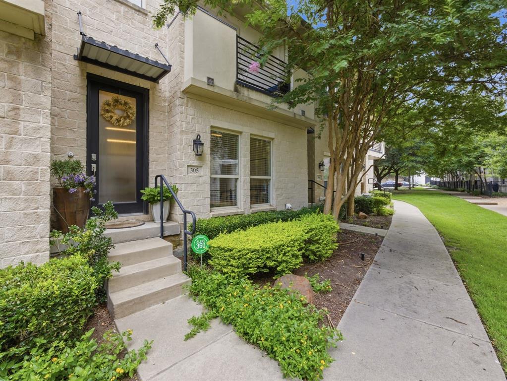This gorgeous, luxury condo is tucked in the most beautifully landscaped community and within walking distance to an entrance to the White Rock Trail and Valley View Park. It offers you the combination of city living with the serenity of nature. It is centrally located in North Dallas close to major highways and where the new HEB is being built at 635 & Hillcrest and by the Dallas Mavericks new home at Dallas Midtown District. 
The flexible floorplan has 2 primary suites with full bathrooms & walk-in closets. The 3rd floor suite bathroom has a separate tub and shower and an area outside the bedroom that is perfect for a sitting, study or office area.  Both suites have utility rooms on their level for a washer & dryer (1st & 3rd floors). In 2023, sellers had real wood flooring installed on the 3rd floor sitting area and in the bedroom to match the wood flooring in the home, the inside of the home painted with warm and updated colors, installed a new dishwasher and purchased new stackable washer & dryer which will convey with the sale of the home.
The living space on the 2nd floor has 10’ ceilings, a cozy cast stone fireplace with gas logs, an open floorplan including the kitchen, dining and living spaces. The kitchen has SS appliances, refrigerator, granite countertops with decorative pendant light fixtures. There is a private office or study which could be a small third bedroom if needed. There is also a full bath and a balcony patio which is perfect to relax and enjoy your coffee in the mornings or evenings on the 2nd level. 
This home has great storage space, newer HVAC system, good size 2 car garage and a tankless water heater.  The HOA covers cable, internet, water, sewer, trash, and landscaping, allowing for effortless living. Low maintenance, immaculately maintained and move-in ready!