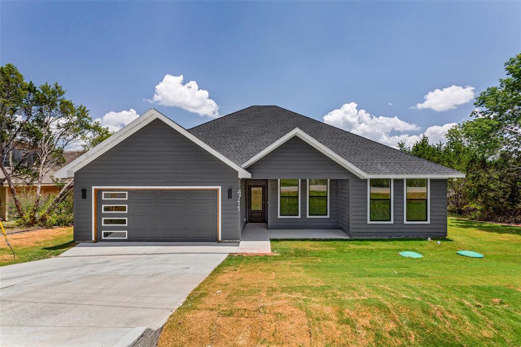 Discover this stunning brand-new 4-bedroom, 2-bathroom home in Granbury, Texas, thoughtfully designed with modern finishes and an inviting open-concept floor plan. From the moment you step inside, you'll appreciate the bright, airy living spaces that seamlessly connect the living room, dining area, and kitchen, perfect for everyday living and entertaining alike. The kitchen is sure to impress with beautiful quartz countertops, a spacious center island with seating, stainless steel appliances, generous cabinet storage, and plenty of counter space for meal preparation and gathering with family and friends. Escape to the private primary suite, complete with a spacious walk-in closet and a beautifully appointed ensuite bathroom featuring dual vanities and a glass-enclosed walk-in shower. Three additional bedrooms provide flexibility for family, guests, or a dedicated home office, while the second full bathroom is conveniently located. Outside, enjoy a covered back patio overlooking the backyard, an ideal space for morning coffee, weekend barbecues, or simply relaxing outdoors. Located in the sought-after Canyon Creek community, residents enjoy exceptional amenities including a guarded security gate, community clubhouse, swimming pool, fishing pier, tennis courts, and multiple boat ramps with convenient access to Lake Granbury. You'll also be just a short drive from Granbury's historic downtown, shopping, dining, and entertainment. Don't miss the opportunity to own a beautifully crafted new home in one of Granbury's most desirable gated communities. Schedule your private tour today!