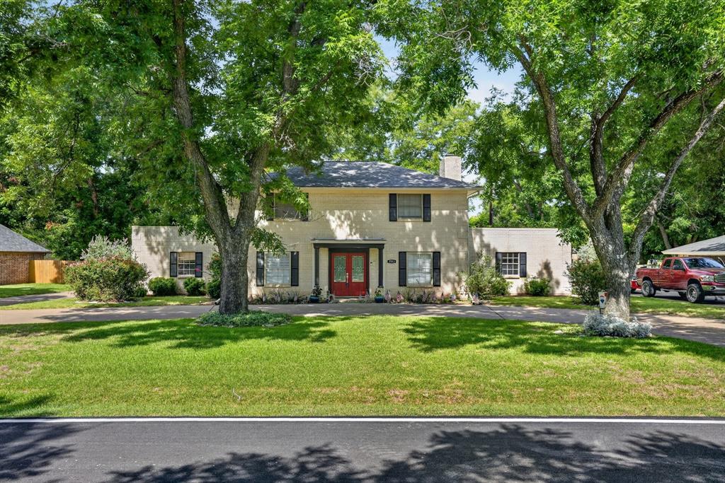 BETTER THAN EVER! A shaded, circle drive welcomes you to a charming 2-story home. Stunning features include plantation shutters, LED lighting in the kitchen, dining and utility rooms; new front door; freshly painted walls, c-tile flooring, new dishwasher and gas range. New granite in kitchen and baths. 3 new AC units, 120-gallon propane tank; new 2-year-old hail-resistant composition roof.  New deck and patio and new cedar privacy fence. Per seller, 900 additional sq. ft. were added with a new primary bedroom and bath.  Compares to newly built housing. A gorgeous home.