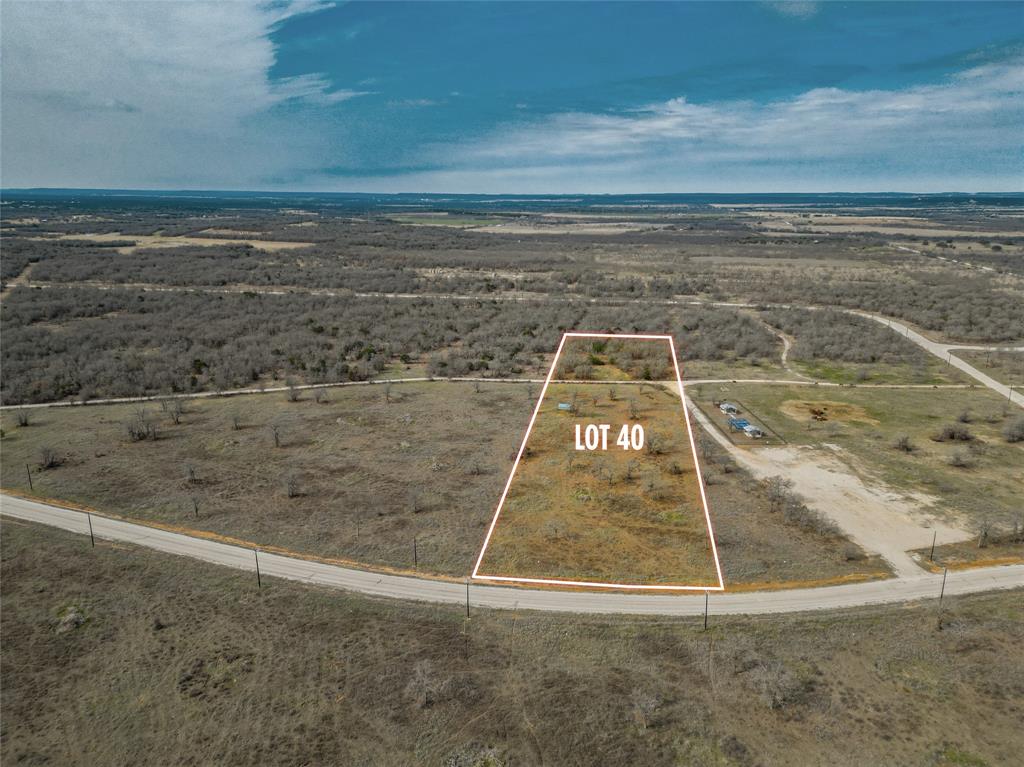 Looking for over 5 acres of peaceful paradise in the country? This could be IT! Tucked into the Paradise Oaks Ranch development 19 minutes from Mineral Wells and only minutes to the towns of Graford or Perrin. The land is mostly level with an abundance of trees on the west end of the property. It's the perfect place to build your new home or vacation getaway. BARNDOMINIUMS ARE ALLOWED! Property is Ag exempt as it is part of a grazing association. This Property is adjacent to the community lot that features covered picnic tables, playground equipment, pickle ball court, & BBQ's. No manufactured homes are allowed. 2 lots to the south of this lot are available for the same price and are nearly the same size as of February 23rd, 2026.