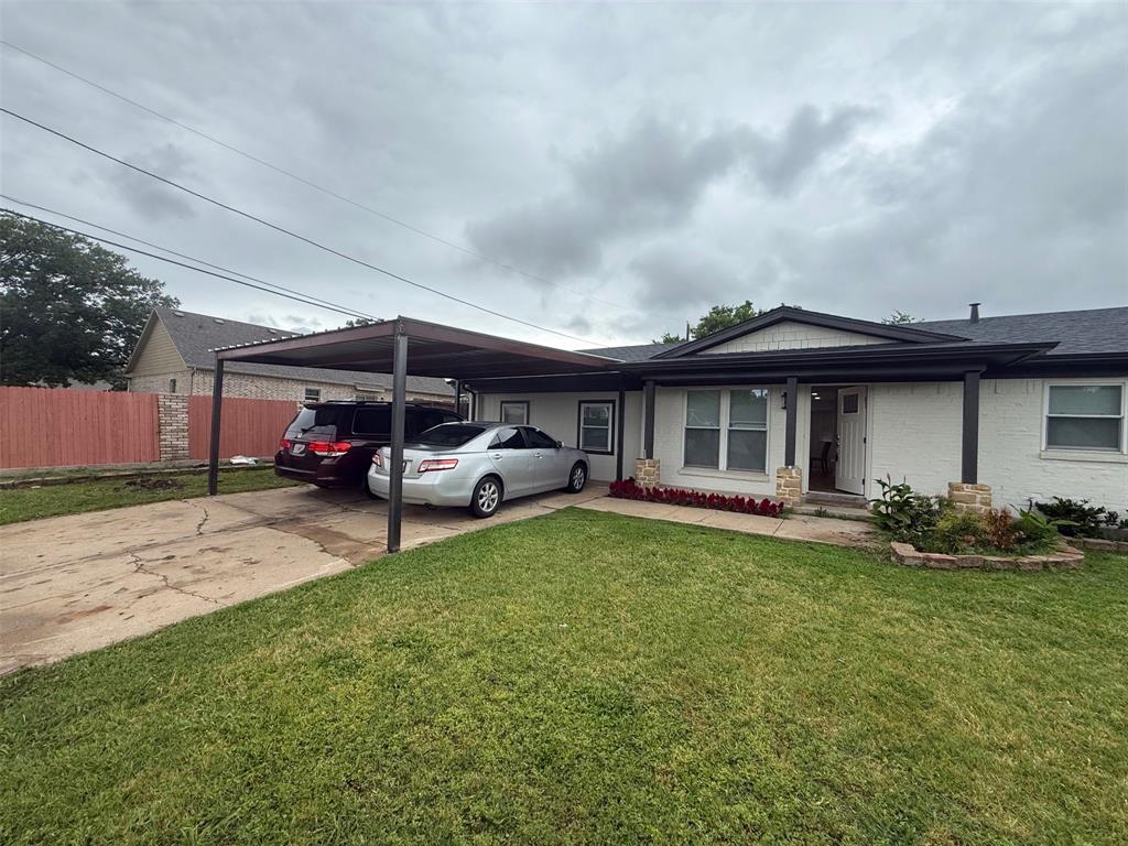 LIKE NEW! Features a brand-new carport and newly installed breaker panel.  House Hack Opportunity or Ideal Multi-Generational Living! This fully renovated 4-bedroom, 3 full bathroom home is perfectly set up for flexibility—whether you’re looking to offset your mortgage by renting part of the home or accommodate extended family. One of the secondary suites features its own private entrance and full bathroom, making it an excellent option for a mother-in-law suite, guest quarters, or income-producing space.

Inside, the home has been completely updated and is in top-notch condition. Enjoy brand new LVP flooring throughout, fresh interior and exterior paint, and three fully remodeled full bathrooms with modern finishes. The home also features all new windows, providing abundant natural light and energy efficiency, along with a new roof and gutters for long-term peace of mind.

Additional highlights include a built-in desk area perfect for working from home, a dedicated storage room, and a functional layout designed for both everyday living and entertaining.

Step outside to a spacious patio area, perfect for relaxing or hosting gatherings, all overlooking a huge lot with a brand new fence for added privacy.

Situated in a great location, this move-in ready home offers high-end upgrades, functional design, and rare versatility—making it a must-see opportunity for homeowners and investors alike.