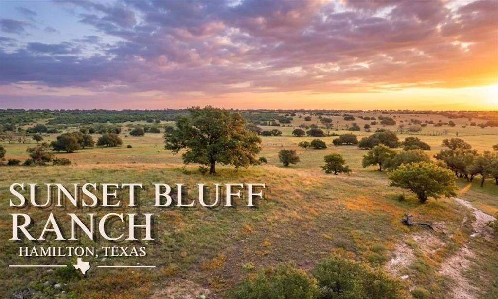 Sunset Bluff Ranch is an exceptional 854 acre ranch located on paved FM 1047 between Star and Hamilton in desirable Hamilton County. Offering a rare combination of strong water features, dramatic elevation changes, productive grazing land, and recreational appeal, this property is well-suited for both ranching operations and weekend enjoyment.
The ranch features rolling native pasture, scenic ridges with panoramic long-range views, heavily wooded areas for wildlife cover, and multiple natural creeks winding through the property. Eight tanks provide excellent water sources for livestock, fishing, and wildlife habitat, creating an ideal setup for cattle, hunting, and outdoor recreation.
Improvements include a well-maintained 4 bedroom, 3 bath brick home overlooking the largest tank on the ranch. Additional improvements include a large metal barn with sliding doors and attached covered space, along with several smaller barns and sheds supporting ranch operations.
With extensive paved frontage along FM 1047, numerous potential homesites, abundant wildlife including whitetail deer, turkey, and dove, plus excellent bass fishing opportunities, Sunset Bluff Ranch offers versatility, accessibility, and outstanding natural beauty in the heart of Central Texas.
Whether you are seeking a productive cattle ranch, recreational retreat, investment property, or future legacy ranch, Sunset Bluff Ranch presents a rare opportunity to own a premier Hamilton County property.
