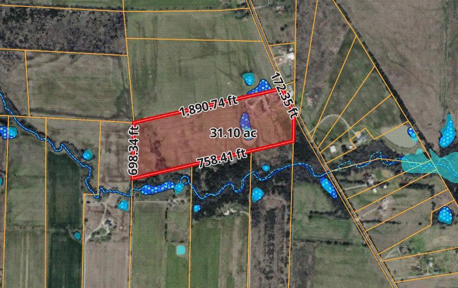 Prime 31.15-acre development opportunity with excellent road frontage at 949 County Road 1410 in Bonham, Texas! This unrestricted, ag-exempt property in Bonhams ETJ offers tremendous potential with water and electric already onsite and ready for immediate use. Featuring substantial road frontage along County Road 1410, flat and highly usable, and multiple build sites, it is perfectly suited for a private country estate, mini ranch, barn dominium, or future subdivision. An existing home on the property can serve as an owner’s office, guest house, or income-producing rental while developing the land. Located in a high-growth corridor of Fannin County, this parcel is well-positioned to benefit from planned road expansions and regional development, combining peaceful rural living today with strong long-term investment upside. Whether you seek a turn-key homestead with rental income or a smart development opportunity in North Texas, this versatile property with excellent road frontage is a rare find. Call today to schedule your private tour.