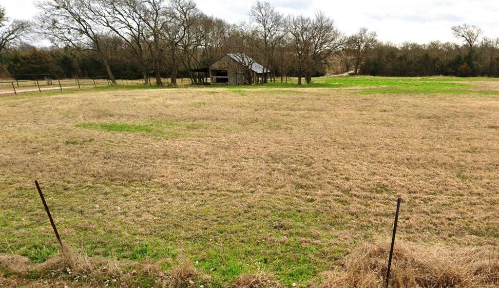 Your slice of Texas awaits, nice clean rectangle tract, out of the city limits and say goodbye to PID and HOA concerns. Deed restrictions help protect your investment and preserve the character of the neighborhood, ensuring your property value for years to come. Build your custom dream home and savor the beauty of both sunrise and sunset over your very own land. Builder owns this tract and would love to help you build your home. Old Barn still on subject still could be repaired.