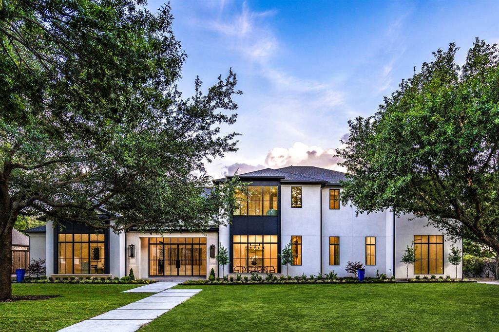 Extraordinary new construction home in prestigious Preston Hollow! Custom built home with features that include Durango steel doors to match surrounding windows, Pella windows and sliding glass doors, quartz countertops, rift white oak cabinetry, 9 inch baseboards, Thermador and SubZero appliances, luxury plumbing features, washer and dryer connections in both the utility room and the primary suite, a unique hamper drop-off system from the upstairs bedrooms to the laundry room, and much more! The primary suite is located on the main floor and includes two oversized closets and a luxurious spacious bathroom. Wetbar, guest bedroom and home office also on the first floor. Second floor includes a game room, exercise room and three bedrooms, each with en-suite bathrooms and walk-in closets. Pre-wired for wireless internet and Sonos controlled sound throughout the property. Backyard includes pool, spa, turf and an additional 900 sq ft Cabana House complete with outdoor kitchen and bathroom.
