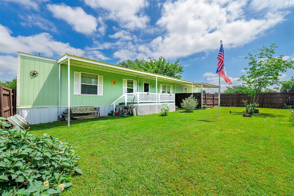 Embrace the ultimate lake-community lifestyle in this beautifully UPDATED, move-in-ready gem nestled on a spacious CORNER LOT. Located at 1501 Lark Ct in the welcoming PELICAN BAY neighborhood of Azle, Texas, this charming 3-bedroom, 2-bathroom home radiates a WARM and INVITING atmosphere from the moment you arrive. Step inside to discover a bright, airy OPEN-CONCEPT layout featuring stylish wood-look flooring and fresh, MODERN INTERIOR paint throughout. The heart of the home is a SPACIOUS kitchen equipped with custom painted cabinetry, a central island, a convenient breakfast bar, and a brand-new stainless steel sink with an updated faucet—making it the perfect backdrop for cozy family dinners or effortless entertaining. Every detail has been thoughtfully UPDATED to provide pure COMFORT and peace of mind. Retreat to your PRVATE primary suite, which boasts an elegant, brand-new WALK-IN shower and stylish new tile flooring. Practical upgrades ELEVATE EVERYDAY LIVING, including new ceiling fans, a new hot water heater (installed April 2026), electric locks, and an attached covered carport. Outside, the generous 0.22-acre lot features a secure privacy fence and a wired 10x12 storage shed. Best of all, you are just minutes from the water, where you can enjoy FREE neighborhood AMENITIES like a community boat launch, fishing pier, park, and playground. This home is a heartwarming opportunity to capture the relaxed, year-round lake lifestyle you have been dreaming of!