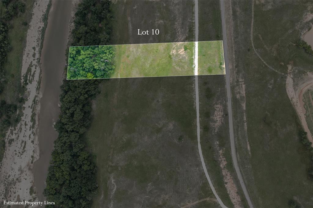 One of the most unique parcels in the area, Lot 10 offers direct frontage along a scenic river, giving you that rare combination of open pastureland and lush, wooded riverbank all in one property. From the paved road, the lot opens up into a wide, grassy clearing before transitioning into a beautiful canopy of mature hardwoods that line the river's edge — a natural paradise for fishermen, or anyone who simply loves the outdoors.
Aerial views reveal the incredible setting: sweeping green pastures, multiple ponds nearby, and miles of unspoiled Texas countryside stretching in every direction. The property benefits from paved road frontage and an internal drive, making access easy while still feeling completely removed from city life.
Whether you're envisioning a private riverside retreat, a hunting camp, or a custom home site with a view money can't buy, Lot 10 delivers. Abundant wildlife, and the peaceful sounds of the river — this is Texas land ownership at its finest, just a short drive from Fort Worth.