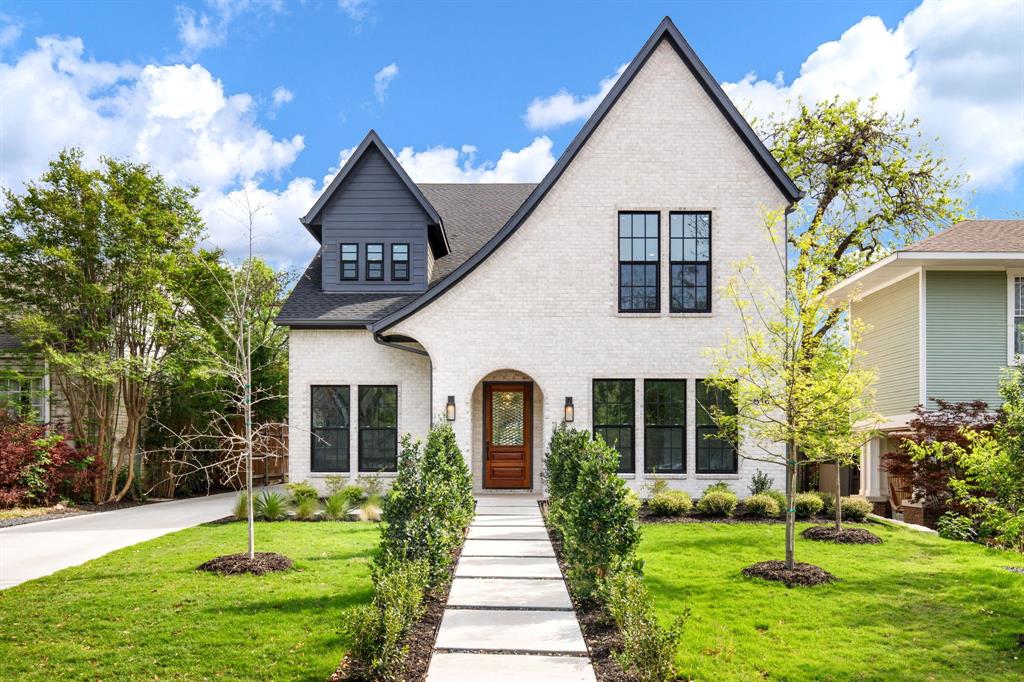 Stunning new build in coveted Lakewood Heights blending timeless architecture, elevated transitional design, and curated modern finishes with exceptional craftsmanship throughout. This professionally designed 5BR, 5.5BA residence includes a separate guest house and delivers a thoughtful layout tailored for today’s lifestyle. Main level features a private office with iron doors, spacious dining room with custom built-ins, guest suite with ensuite bath, and an expansive living area filled with natural light. Gourmet kitchen showcases premium appliances, oversized island, breakfast nook, and appointed catering pantry seamlessly designed for everyday living and entertaining. Upstairs offers two secondary bedrooms, flexible bonus space, and a luxurious primary retreat with private patio, fireplace, spa-inspired bath, and oversized walk-in closet pre-plumbed for W & D. Detached 1BR, 1BA guest house includes kitchenette and living area ideal for guests, multigenerational living, or private studio. Soaring ceilings, hardwood floors, designer lighting, and bespoke details throughout. Minutes from White Rock Lake, dining, and shopping.