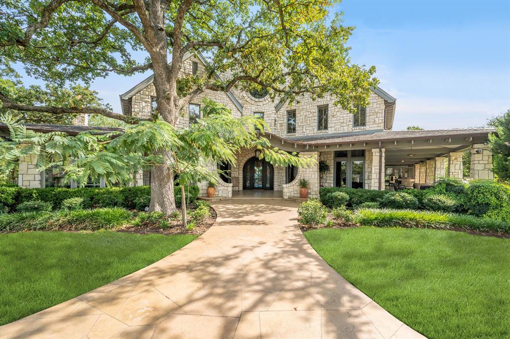 Private gated estate on 5.4 acres in Hickory Creek, this home is open to endless possibility. With 5 spacious bedrooms and baths, an in house gym, sauna, custom master closets, fine china pantry, speakeasy and air conditioned storage, luxury is at your fingertips in every capacity. The traditional, hill country exterior welcomes residents both in and outdoors into the various kitchen and entertainment spaces. Conveniently located near Liberty Christian and Lake Lewisville, the surrounding community matches the extraordinary quality of this home.