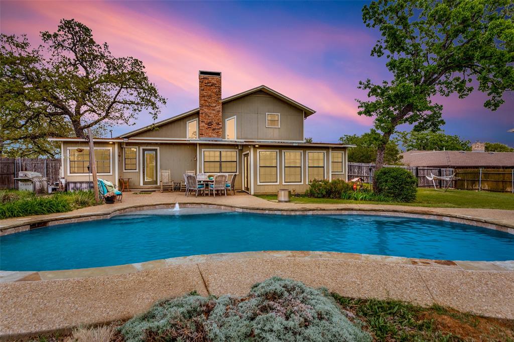Move-in ready, This home has an open concept and easy floor plan, a private backyard complete with refreshing pool, on nearly 1-acre. Welcome to Windsor Circle on a private cul-de-sac.There truly is room for everyone. Entertaining made easy, private backyard, pool, tree house, mature trees, landscaped and fully fenced.
The home doesn't just have space, it has the right space. Two living areas and two dining spaces make hosting family and friends effortless. A flex room, dedicated office, and sun-drenched sunroom mean everyone can find their favorite corner. Gather and enjoy cooking in the open kitchen. Four generously sized bedrooms and three full baths round out a floor plan that truly works for everyday life.The Heart of the home, the open living areas flow naturally from room to room - soaring ceilings, warm wood floors, a classic brick wood-burning fireplace, natural light pouring in from every angle. A corner sitting area in the kitchen with backyard views makes it easy to keep an eye on the action outside while still feeling cozy inside.
A Backyard Built for Living-swim, grill, garden, kick back in the shade-a fenced backyard gives you total privacy while the kids take over the tree house. A double gate provides easy access for trucks, trailers, boats, and even RV parking.
Bonus-the newer 848 sq. ft. detached garage with its own electricity is ready to become whatever you need, workshop, artist studio, she shed, man cave, or home office. The options are endless.
At a Glance-
.79 acre lot on a cul-de-sac
4 bedrooms, 3 full bathrooms
2 living areas + 2 dining areas + kitchen + flex room(easily a 5th bedroom) + office + sunroom 
Plenty of storage throughout the home
Gorgeous pool + treehouse + mature landscaping.
848 sqft. detached garage+workshop with separate electricity.
Double gate for backyard access-RV, boat, and trailer friendly.
Buyers independently verify all information, including taxes, schools, and square footage.