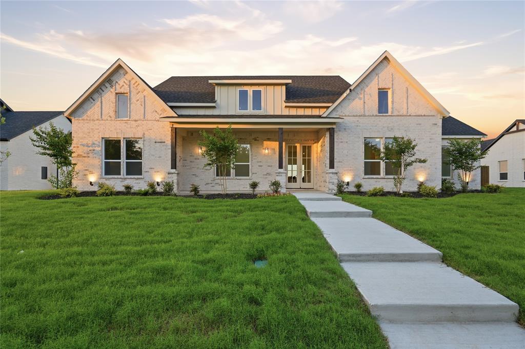 Embrace the ultimate master-planned lifestyle in Devonshire, where this stunning custom home sits proudly on a rare, sprawling half-acre lot. Designed for both active living and easy relaxation, this vibrant community features onsite schools, parks, sports courts, and scenic walking trails leading right to a peaceful fountain and duck pond—all wrapped up with a remarkably low HOA.

From the moment you arrive, the residence captivates with its striking clean architectural lines and a welcoming covered front porch. Step inside to an airy, light-filled sanctuary where soaring vaulted ceilings and an effortless open-concept flow instantly elevate everyday living and entertaining. The heart of the home is a dramatic living room, anchored by a magnificent floor-to-ceiling fireplace with custom built-ins that balance grand scale with warmth.

The adjacent gourmet kitchen is a chef’s dream, blending high-end function with sophisticated style. It centers around an oversized quartz island and features custom cabinetry, premium appliances, and an ingenious hidden walk-in pantry that keeps prep space abundant and clutter-free.

When it is time to unwind, the luxurious primary suite offers a private, spa-inspired escape complete with an elegant tray ceiling and a calming designer aesthetic. The home's clever layout includes versatile secondary bedrooms perfect for guests, a quiet home office, or multi-generational arrangements.

The experience flows naturally outdoors to an oversized covered patio. Overlooking a massive backyard with endless green space, it offers a blank canvas with plenty of room for lively entertaining, play, or your future dream pool. Perfectly balancing modern luxury with a deeply connected neighborhood culture—and offering quick access to shopping, dining, and major highways—this exceptional property is more than just a house; it is a lifestyle.