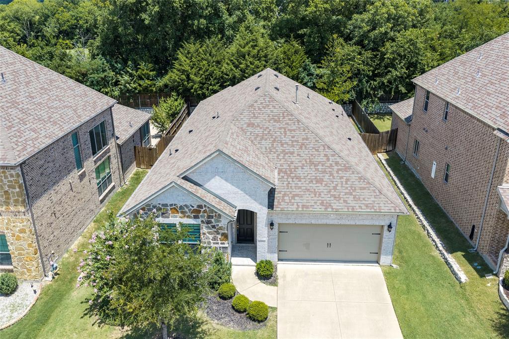 Price Reduced to Sell!!! Motivated Seller! Bright and beautifully designed open concept one story home featuring 3 bedrooms, 2.5 bathrooms, and a private office with elegant double French doors, located in the highly sought-after Hardin Village community. Thoughtfully designed with split bedrooms and a separate office space, this layout offers added privacy and flexibility for today’s lifestyle. The gourmet kitchen overlooks the spacious main living area and features modern white cabinetry, stainless steel appliances, quartz countertops, a gas cooktop, a large dining area, and abundant storage. Rich engineered wood flooring flows throughout the main living areas, adding warmth and sophistication. The light-filled living room creates a seamless and inviting atmosphere, perfect for entertaining guests or enjoying everyday family living. The thoughtfully designed primary suite offers a relaxing retreat with a clean, modern finish and a spacious ensuite bath. An electric vehicle charging outlet is already installed, providing added convenience for EV owners. Step outside to the extended covered patio that opens to a private backyard with a generous grassy area, an ideal family friendly space for relaxing, entertaining, or outdoor activities. Conveniently located near Hwy 75 and Hwy 380 with easy access to shopping, dining, and entertainment. Also located just minutes from the middle school for added everyday convenience. Don’t miss this opportunity to experience modern comfort, style, and functionality in this fabulous home!