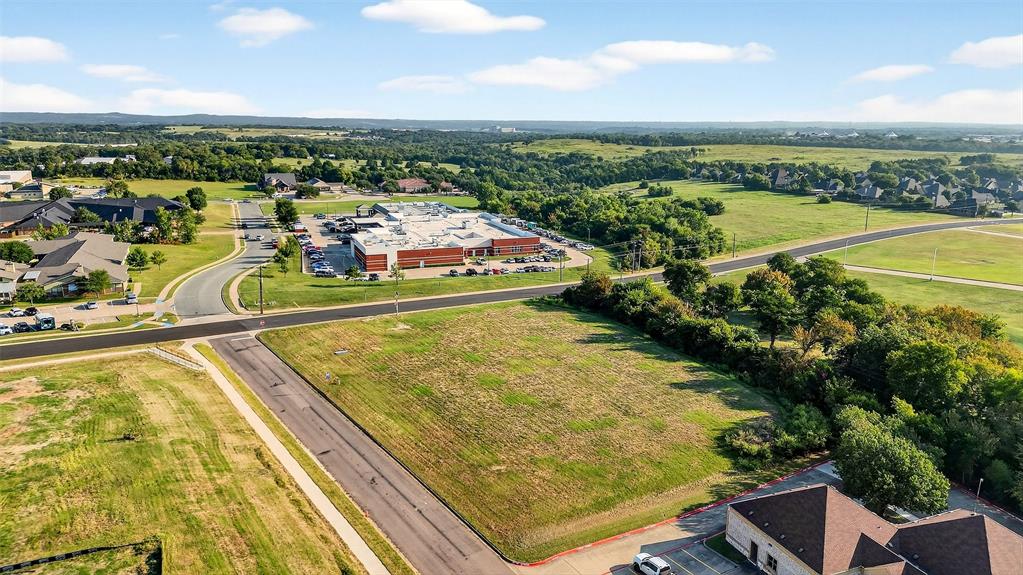 Excellent opportunity to acquire a prime 1.87-acre hard corner in Sherman’s medical hub. With over 500 feet of road frontage, the site offers exceptional visibility for a wide range of users. C-1 zoning makes the property ideal for medical or dental clinics, rehabilitation facilities, professional offices, or retail space. The tract is mostly clear of vegetation and free of floodplain per FEMA maps. The site is surrounded by a strong network of healthcare providers and complementary businesses, including Baylor Scott & White Surgical Hospital, Pecan Point Assisted Living, Hilltop Pediatrics, Surgical Innovations of Texoma, US Dermatology, North Texas Center for Women’s Health, and Innovation Surgical Solutions. Texoma Medical Center, Grayson County's largest employer, is just five minutes away.