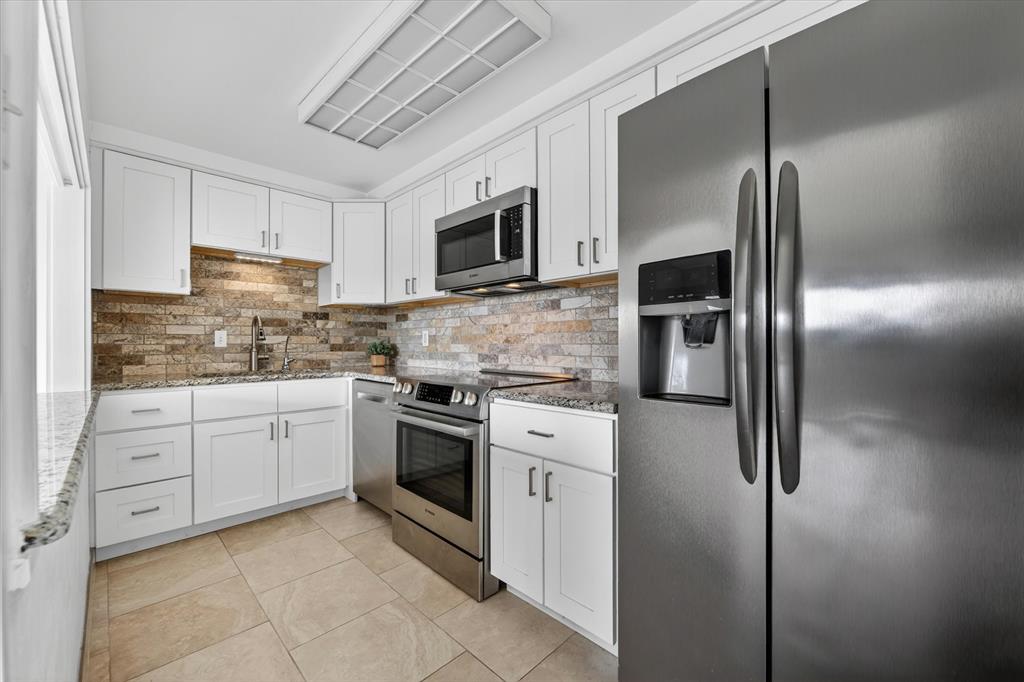 Lock & Leave Luxury in the Heart of Dallas! Welcome to effortless, resort-style living at the iconic Preston Tower. This clean and move-in ready 1-bedroom condo has been thoughtfully updated and is ready for its next owner. The updated kitchen shines with granite countertops, a designer backsplash, and stainless steel appliances. Refrigerator and all-in-one washer and dryer are also included with the sale. Tile flooring runs throughout the entire unit, while walls of windows flood both the living room and bedroom with natural light. Practical touches abound with multiple storage closets, a dedicated laundry room, and a pantry. Step outside to your oversized covered balcony through sliding glass doors — the perfect spot to unwind. Preston Tower delivers an unmatched amenity package: 24-hour concierge, assigned covered garage parking, resort-style pool, firepit, community room with a shared library, pickleball and tennis court, fitness center, on-site barber, coffee shop, and the beloved Bernie's Cocktail Lounge — just to name a few. Ideally located minutes from major highways, Northpark Center, and Preston Center, this is the ultimate in convenience and lifestyle.