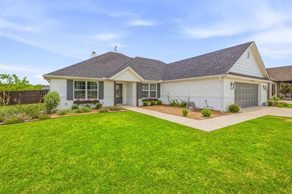 Enjoy peaceful country living with the convenience of a prime location in highly sought-after Aledo ISD. Situated outside the city limits with no HOA, this beautifully maintained home offers the perfect blend of comfort, space, and affordability. Step outside to your own private backyard retreat featuring a spacious covered patio, sparkling pool, and large yard—ideal for entertaining, relaxing, or enjoying quiet evenings at home. Inside, you'll find an open-concept floor plan filled with abundant natural light, seamlessly connecting the living, dining, and kitchen areas for effortless everyday living. A dedicated home office provides the perfect space for remote work, hobbies, or a flex room. The oversized primary suite is a true retreat with ample room for a sitting area or additional workspace. The luxurious ensuite bath features dual vanities, a soaking garden tub, separate walk-in shower, and a spacious walk-in closet. Two generously sized secondary bedrooms are thoughtfully positioned on the opposite side of the home, creating a desirable split-bedroom layout that offers added privacy for family and guests. Additional highlights include a private water well and septic system, helping keep utility costs low while enjoying the freedom of country living. With its exceptional outdoor space, functional floor plan, and desirable location, this move-in-ready home is one you won't want to miss.
