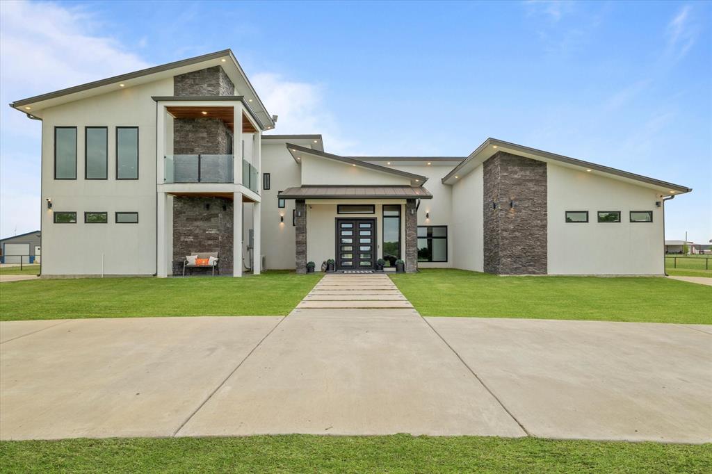 Step outside to enjoy a resort-style setting featuring a sparkling in-ground pool, a fully equipped outdoor kitchen, and a full outdoor bath designed for effortless entertaining and year-round enjoyment.
With unrestricted acreage, no HOA, and ample space for recreation, hobbies, or future improvements, this property offers the perfect blend of luxury, comfort, and country living while remaining conveniently accessible to nearby amenities.The spacious floor plan features a primary suite on the main level complete with a spa-inspired ensuite bath, dual walk-in closets, a fireplace, and a private sitting area. Two secondary bedrooms share a convenient Jack-and-Jill bath, while a separate guest bedroom provides additional privacy for visitors. A dedicated media room and an oversized upstairs office with central networking and AV equipment .Cat 5e prewired ,both inside and outised for WIFI and audio.The chef's kitchen opens to the main living area, creating an ideal layout for everyday living and entertaining while overlooking the backyard retreat. Oversized shop with 3 bays 
Move-In Ready Custom Estate on 3.8 Unrestricted Acres