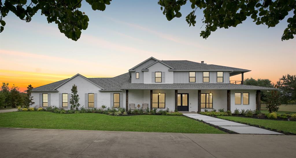 Welcome to Amberwood Farms — a luxurious gated acreage community offering 40+ exclusive homesites ranging from 3–6 acres. It is incredibly rare for a home to become available in this one-of-a-kind neighborhood, located in the Town of Prosper and zoned to award-winning Prosper ISD. 
Nestled on a private 4-acre homesite, this completely remodeled modern farmhouse retreat blends timeless style with today’s most desirable finishes. A grand entrance with brand-new iron double doors opens into a bright and inviting layout designed for effortless living and entertaining. The gourmet kitchen boasts an oversized eat-in quartz island, custom cabinetry, designer hand-laid tile backsplash, walk through panty, designer-series refrigerator, double ovens, and apron-front stainless sink. Warm hardwood flooring, designer lighting, and large windows allow natural light to fill the open living and dining spaces while framing views of the beautiful acreage. The privately located primary suite offers a spa-inspired bath with dual vanities, freestanding soaking tub, marble finishes, and a frameless shower with 3 shower heads. A dedicated study or family planning center, spacious secondary bedrooms, and an oversized upstairs bedroom with private bath and balcony provide flexible living options including multi-generational use. The large upstairs game room adds even more room to gather and play. Step outside to your personal resort — complete with a sparkling pool, expansive patio, lounging structures, and a fire pit area perfect for sunsets and stargazing. With plenty of space for future enhancements like a barn, sports court, or garden, the possibilities are endless.
Welcome home to Amberwood Farms — where luxury living meets wide-open Texas lifestyle.