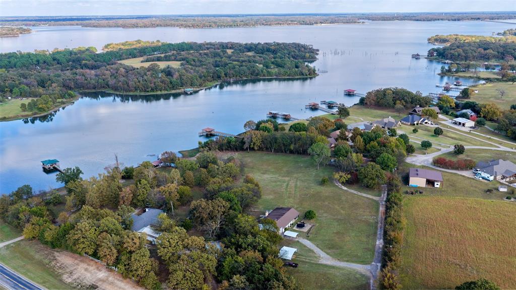 Waterfront on Lake Fork! Premium lot on world famous Bass Lake Fork Reservoir.   Lake front with private boat ramp on Penson Cove. Sabine River Authority lease in addition to ~1.781 acres.  Gorgeous piece of copy try and rare opportunity to build on a lake front with a private ramp.  Home that is on the property needs a lot of work and sold as is.  Possibly could renovate it and use as a short term rental.  Plenty of options with this property.  Buyer and buyer agents to verify details contained in listing.  MLS deemed reliable, but not guaranteed