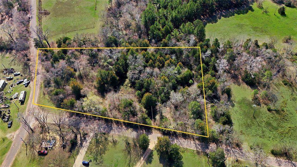 This vacant lot is located in the rural area of Lindale TX. It features 2.5 acres, and is located on the corner of County Road 4122 and County Rd 4129. Land is treed, spacious, and ready for new owner ideas.  There are endless possibilities! Don't miss out!