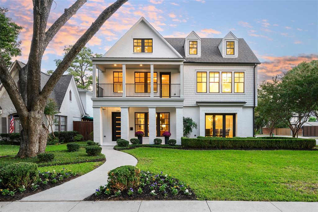 This three-story home in University Park reflects architectural precision and lasting design. The exterior features a large front porch and second-level terrace, both framed by mature trees and stunning landscaping. Inside, a double-height entry introduces an open layout with natural light throughout. White oak floors span the first and second levels. The main floor includes two living areas; one centered on a fireplace with views to the backyard, the other suited for more intimate gatherings. The kitchen includes Viking appliances, dual ovens, stone countertops, a large island, and extensive custom cabinetry. Two dining areas complete the main level. Upstairs, a central living area separates the private quarters. The primary suite sits at the back of the home with a vaulted, wood-beamed ceiling, chandelier, sitting area, and direct access to the back terrace. The bath feels calm and generous with a freestanding soaking tub, walk-in shower, dual vanity, and an oversized custom closet. The third floor adds a full game room with space for media, play, or quiet work. Above the detached two-car garage, a private guest suite includes a full bath, walk-in closet, and room for a kitchenette, offering comfort and independence for guests or extended stays. Out back, a covered patio with a fireplace opens to a fenced yard and gated drive, creating a private outdoor extension of the home. Within walking distance of University Park Elementary and minutes from neighborhood dining and retail, this five-bedroom, six-bath residence pairs architectural integrity with thoughtful livability in one of Dallas’s most established locations.