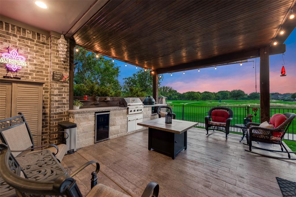 Stunning 4-bedroom, 3-bath home located in a 24-hour gated and guarded resort community on Eagle Mountain Lake. Perfectly positioned on one of the community’s premier lots, this home offers breathtaking golf course views overlooking the 11th, 12th, 13th, and 14th holes. Enjoy spectacular due-west sunsets from the expansive covered back patio, complete with a built-in grill, Green Egg, and beverage cooler—ideal for entertaining or relaxing in style. Inside, the home features an open-concept living, kitchen, and dining area highlighted by soaring coffered ceilings and an abundance of natural light from large windows. The main level includes a private office, formal dining room, spacious living area, laundry room, and a serene primary suite with an ensuite bath. The primary bedroom also enjoys sweeping golf course views. The chef’s kitchen boasts a large island, gas cooktop, and elegant granite countertops. Upstairs, you’ll find a dedicated theater room, game room, and three generously sized bedrooms served by two full baths. Recent upgrades include all new interior paint throughout the entire house, new light fixtures, new walkway on the side of the house, and recently stained front door and garage door. This resort-style community truly has it all. HOA-maintained lawn and landscaping are included, along with access to an 18-hole golf course, restaurant and bar, two swimming pools, fitness center, boat ramp and slips, basketball and tennis courts, playground, and more—offering an unparalleled lifestyle experience.