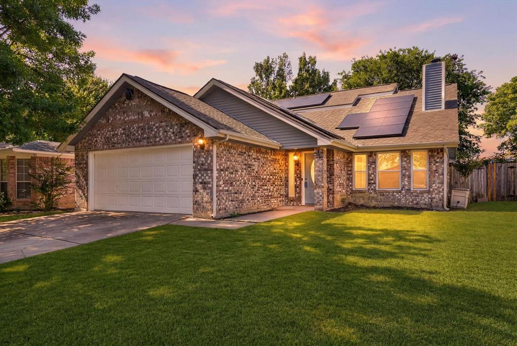 Welcome to this beautifully refreshed two-story home that perfectly blends modern style with massive, built-in energy savings in the highly regarded Eagle Mountain-Saginaw ISD! Step inside to discover a bright and airy living room highlighted by soaring vaulted ceilings and updated light fixtures that create an expansive, welcoming atmosphere. The main living areas shine with durable, easy-to-maintain Luxury Vinyl Plank flooring and crisp, fresh interior paint throughout, giving the entire home a clean, modern, and move-in-ready feel. The heart of the home is further enhanced by a newly installed stainless steel dishwasher, while brand-new carpeting provides ultimate comfort in the bedrooms. Designed with privacy in mind, the highly desirable split floor plan features a spacious first-floor primary suite with a private retreat offering a relaxing tub and separate shower, while the generous secondary bedrooms are located upstairs for fantastic separation. The true showstopper of this property is a premium efficiency package designed to drastically slash your monthly utility bills from day one, anchored by an impressive 8.8kW roof-mounted solar panel system, a brand-new tankless water heater for endless hot water, and an ultra-efficient, top-tier HVAC system upgraded with a high-capacity heat pump in the summer of 2023. Combining a smart layout, stylish fresh updates, and thousands in future energy savings, this charming home offers rare, high-value protection against rising electricity costs—schedule your private tour today!