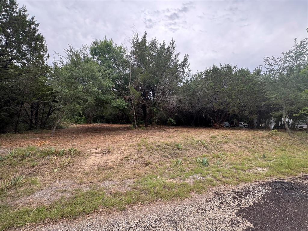 Two combined lots in Granbury ready for your future home. The property has been recently cleared while still leaving several beautiful mature trees for shade and privacy. A great opportunity for someone looking to build on a larger lot with plenty of space. The hard work has already been done, making it easy to start planning your dream build.